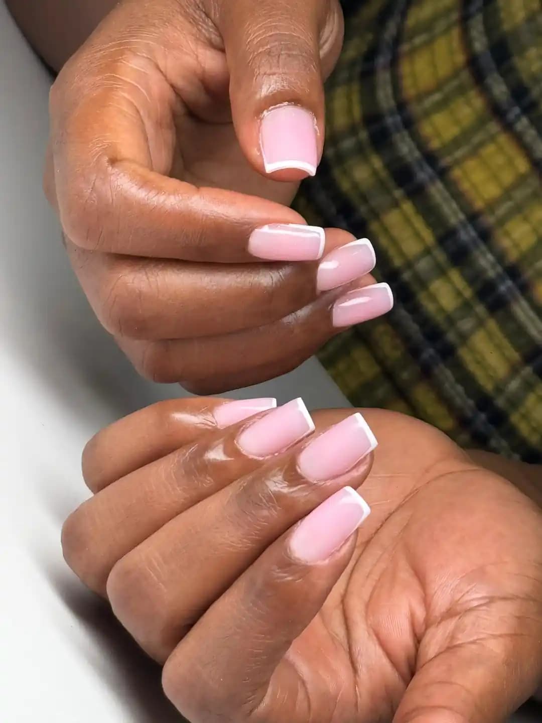 Gel manicure styling with pink square french tips