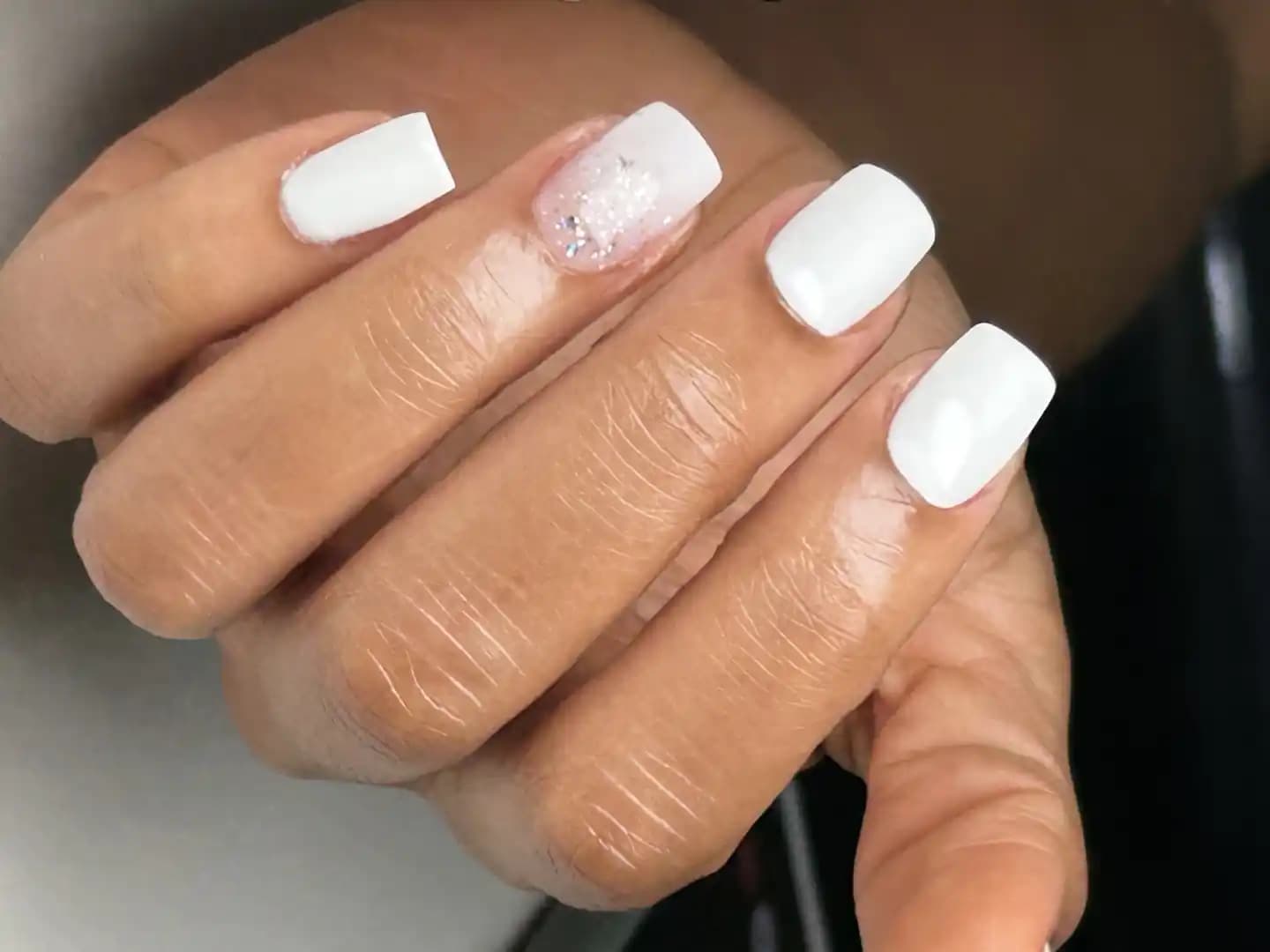 White glitter accent square nails photographed at the studio